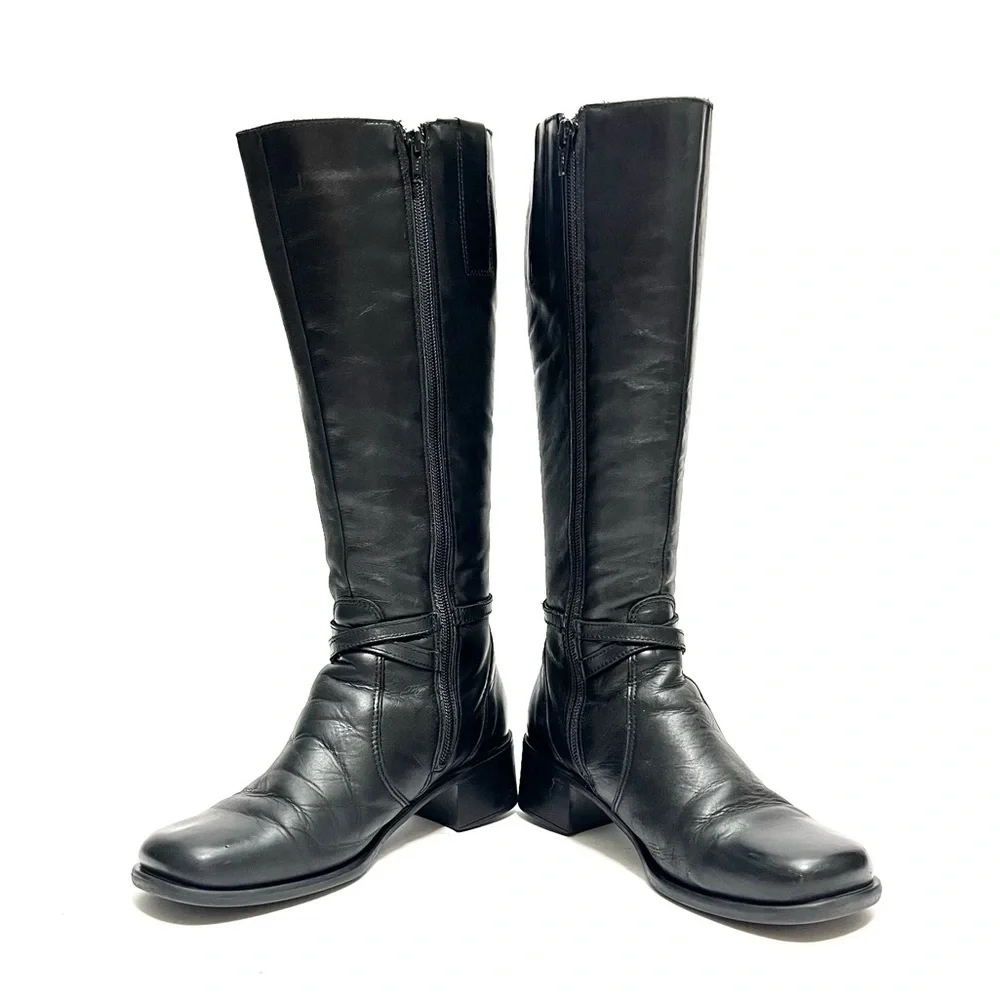 Vintage 1990s black leather knee high wool lined heeled winter fashion boots